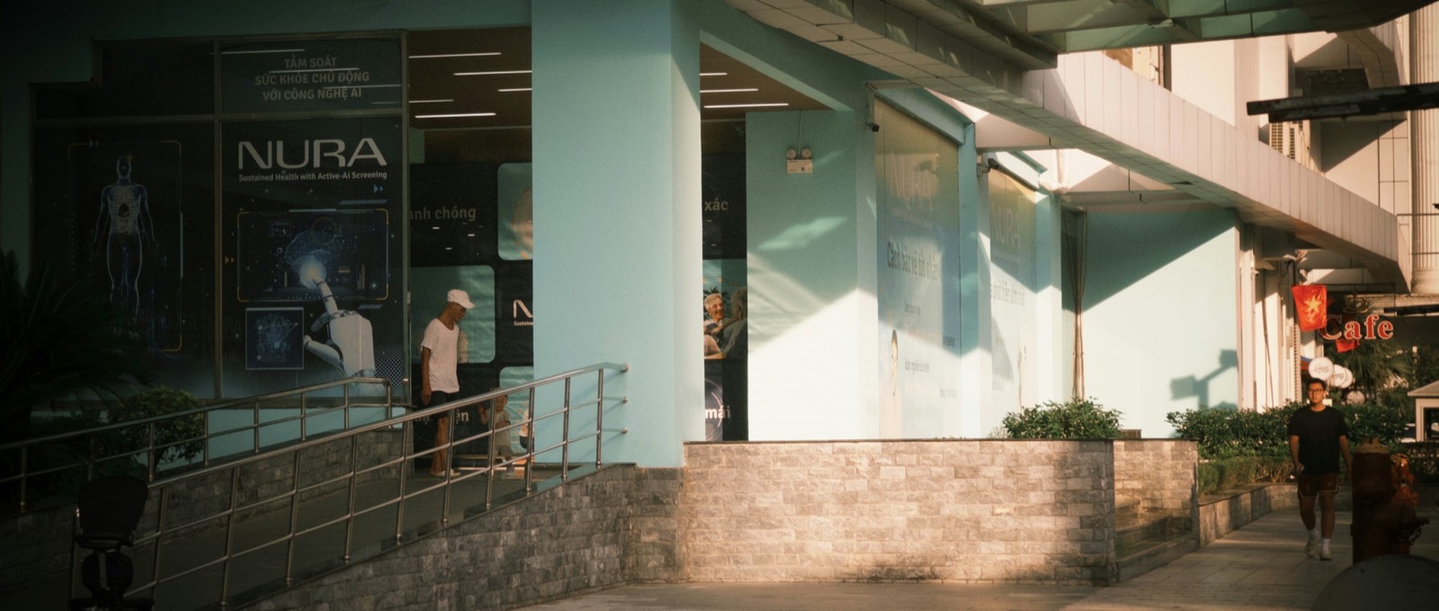 Modern clinic exterior with clean signage — the kind of multi-location practice running on DEM appointment systems.
